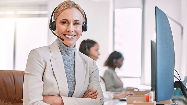 Woman working at the office in front of a computer