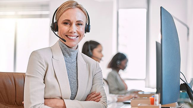 Woman working at the office in front of a computer